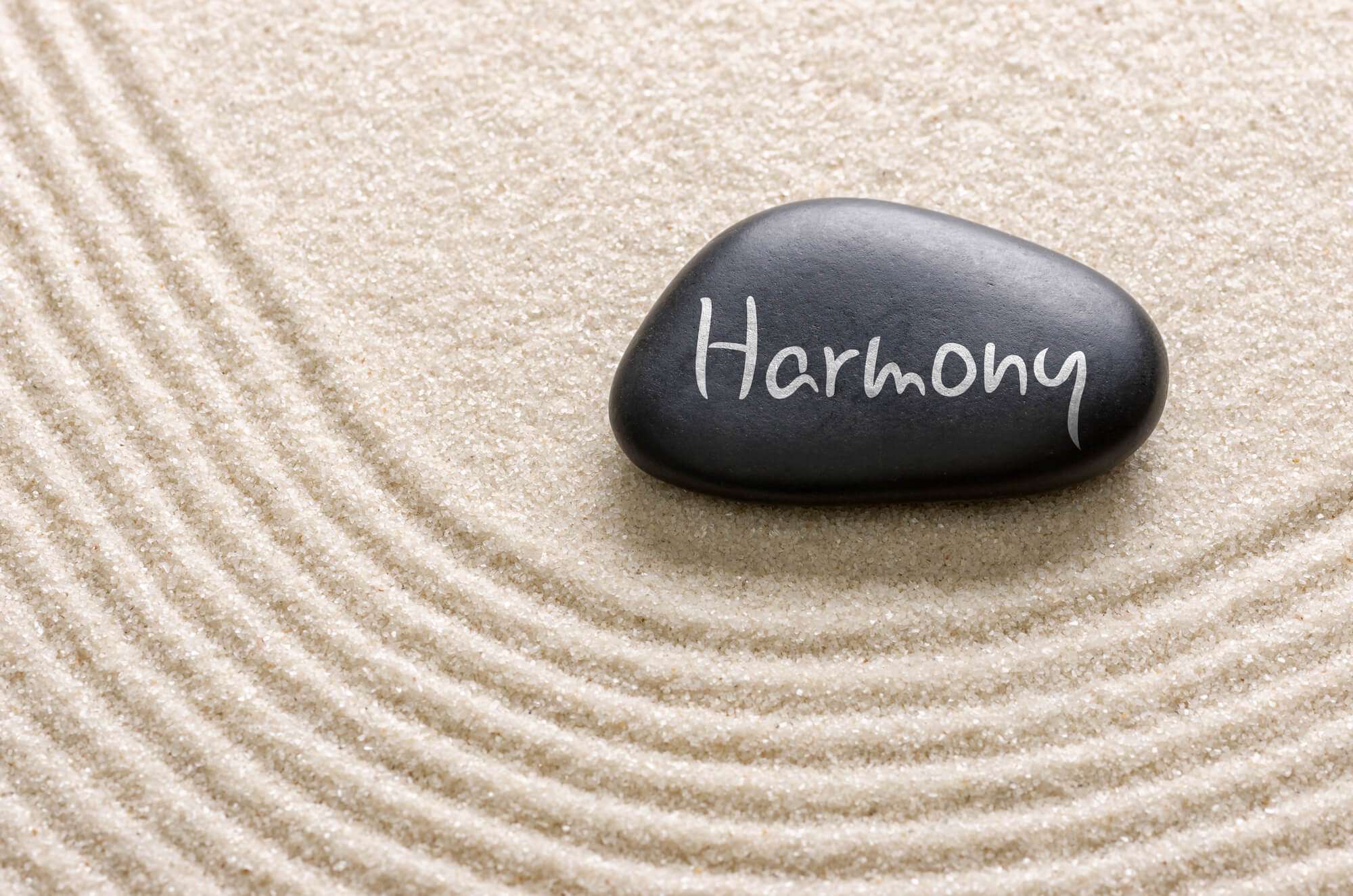 Black stone with the inscription Harmony סוג'יי